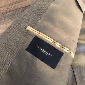 Grey Burberry suit.